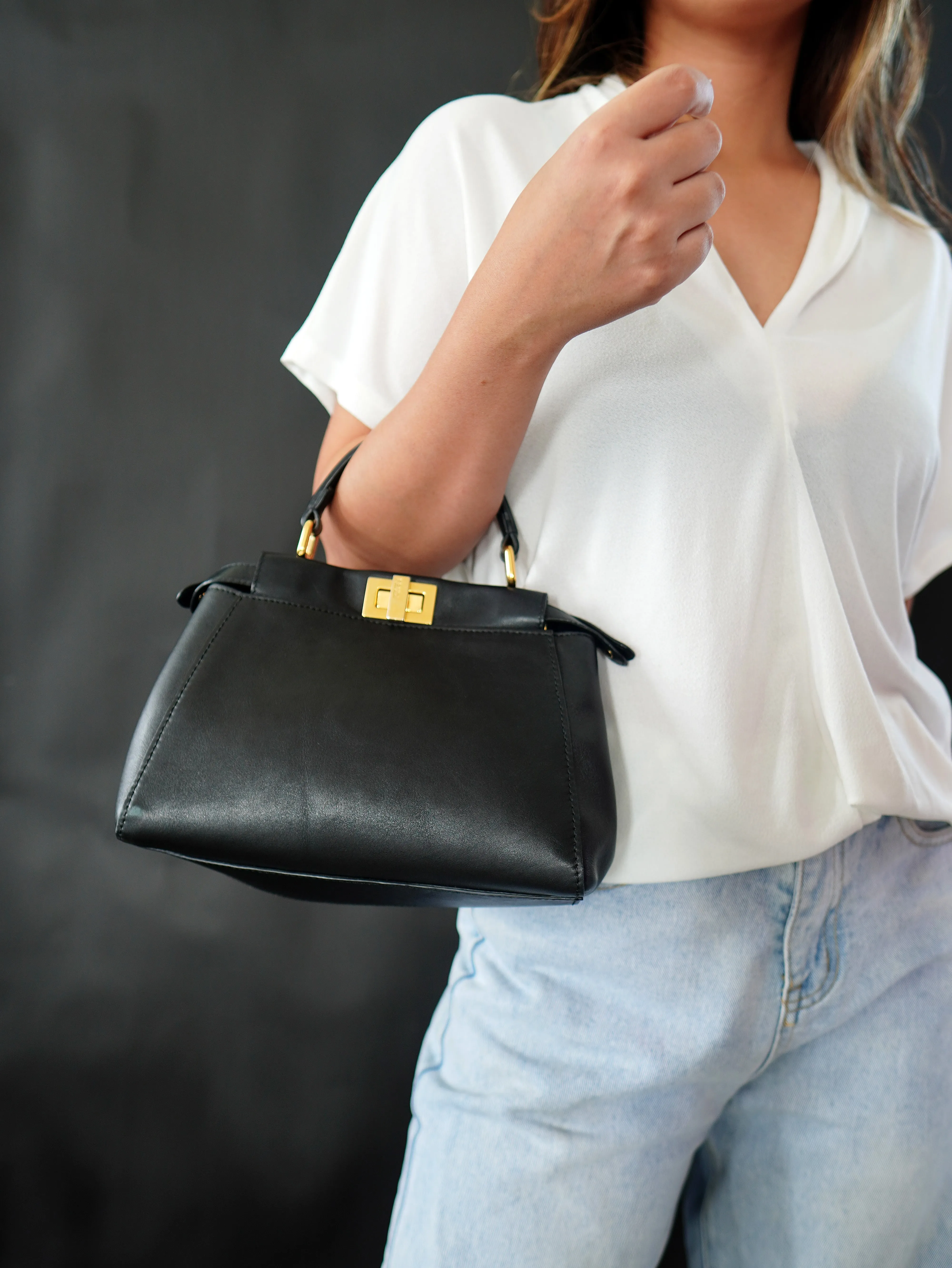 <b>FENDI</b> <br>Iconic Mini Peekaboo