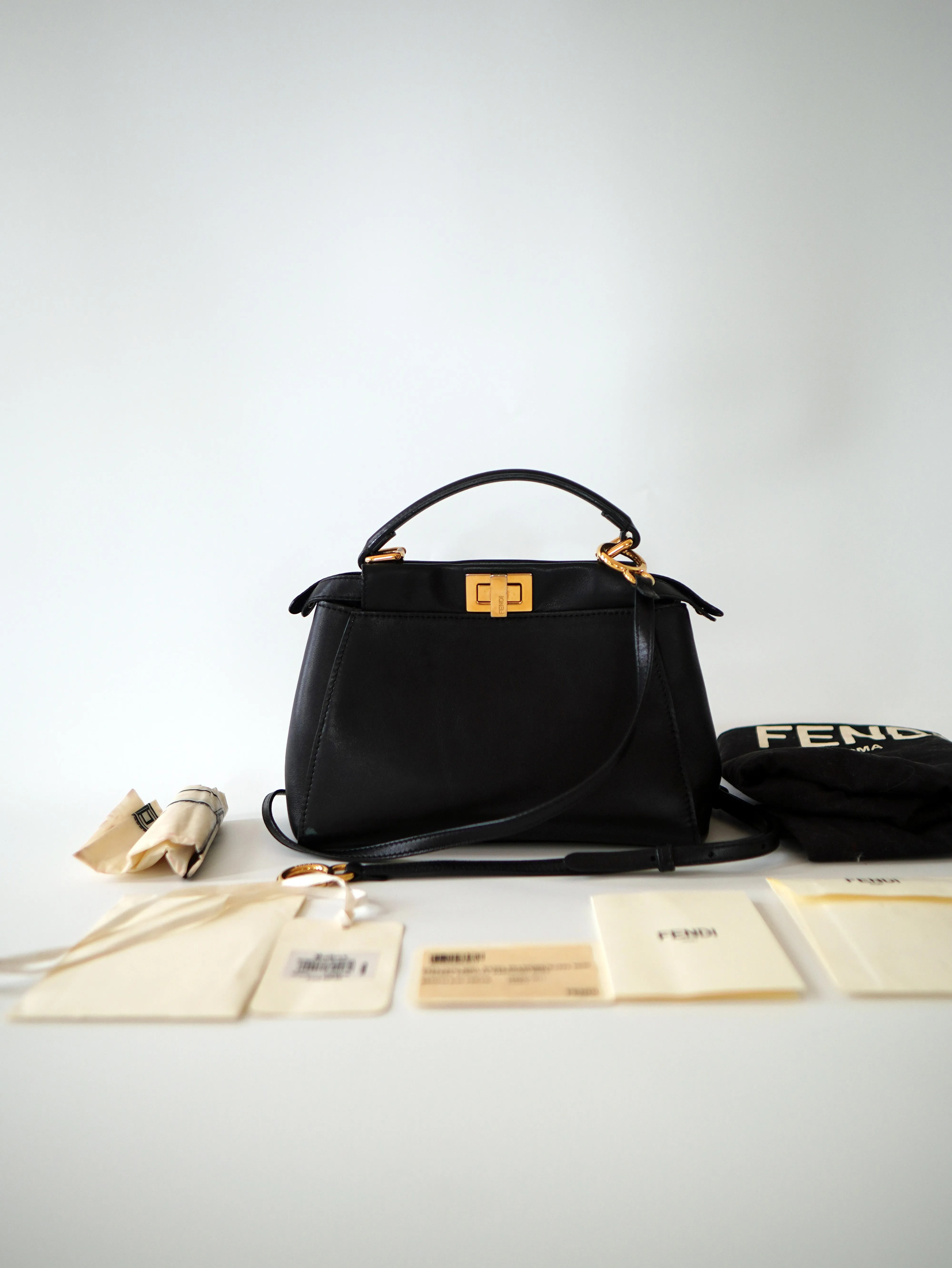 <b>FENDI</b> <br>Iconic Mini Peekaboo