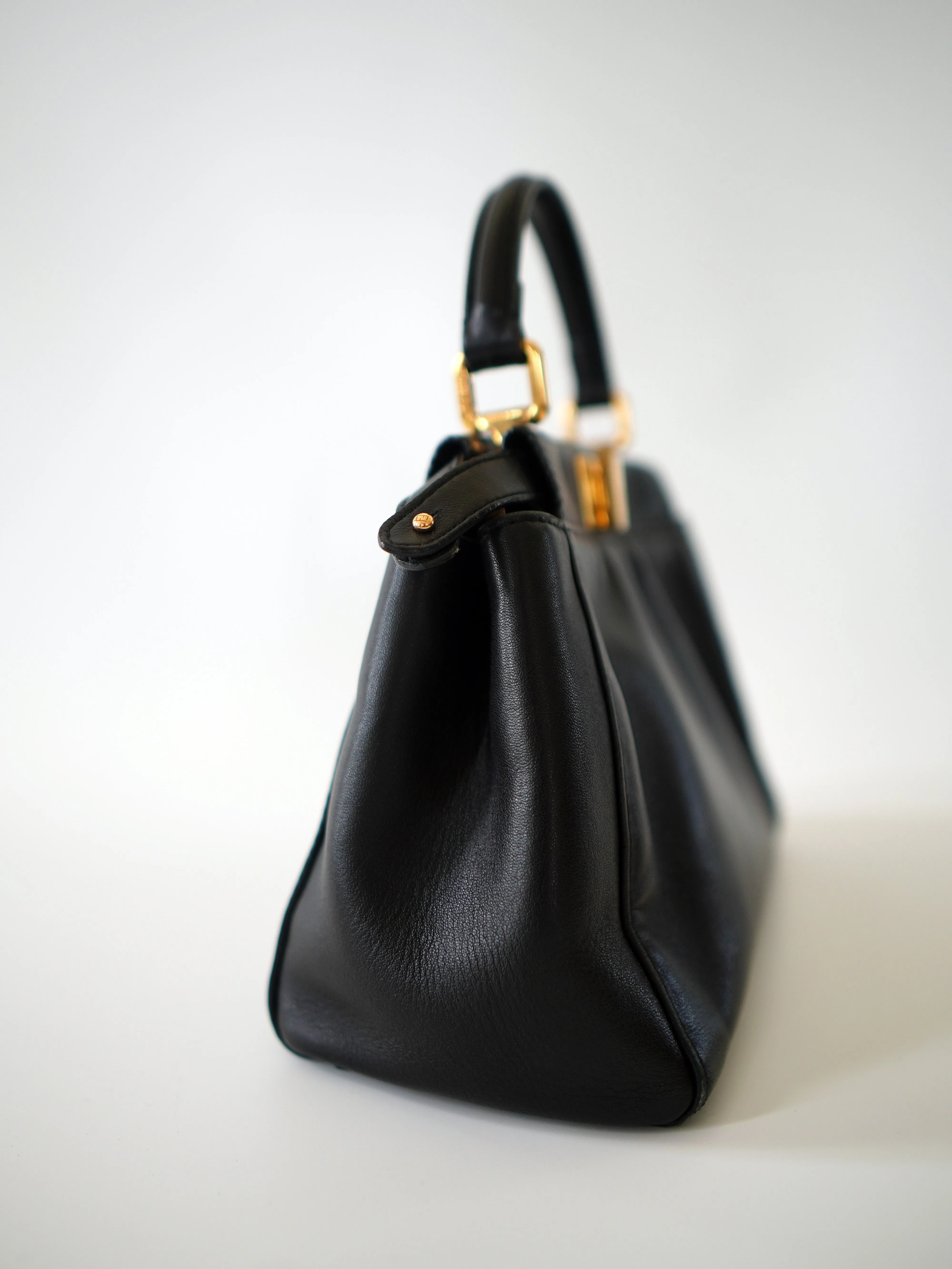 <b>FENDI</b> <br>Iconic Mini Peekaboo