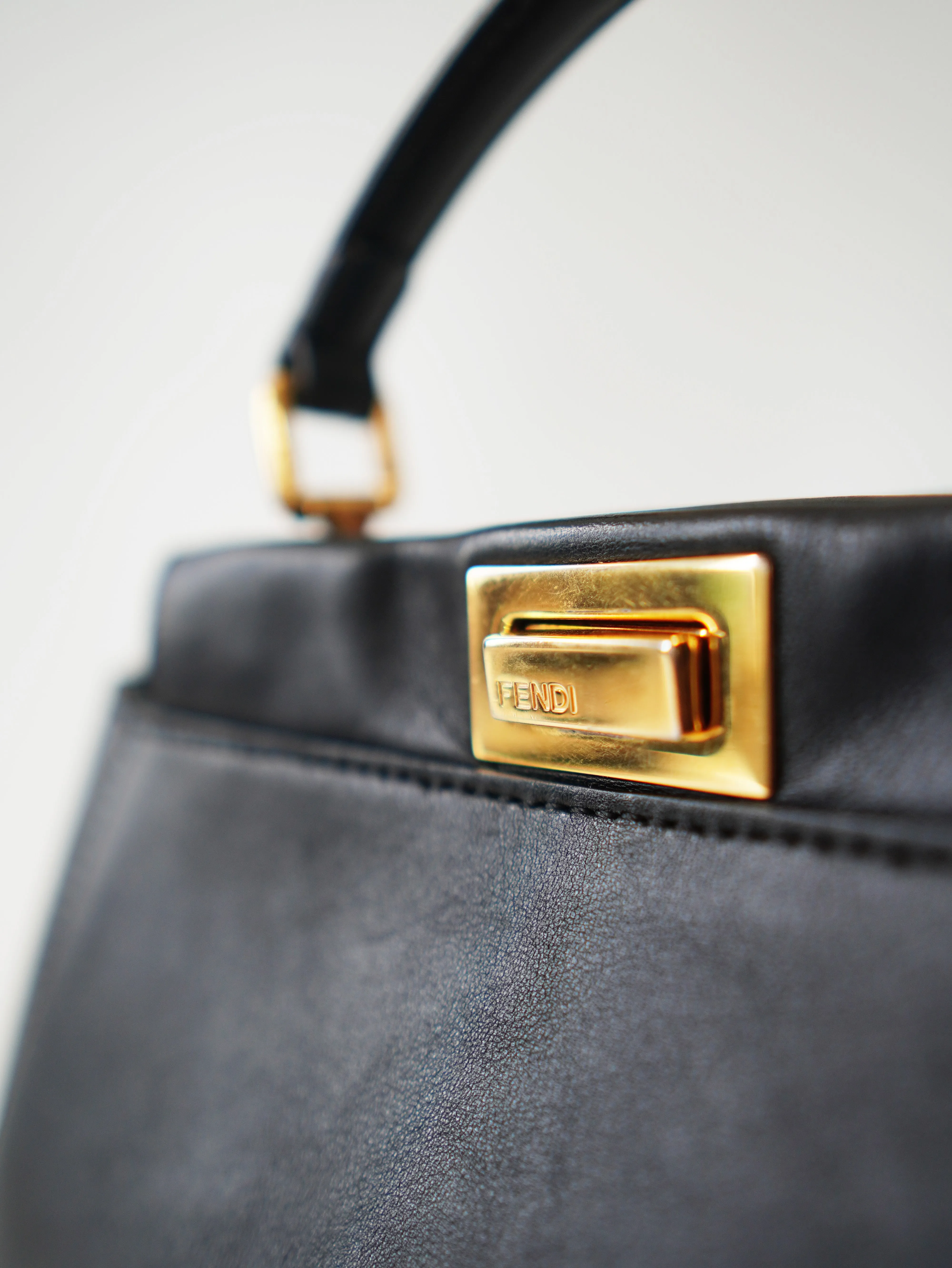 <b>FENDI</b> <br>Iconic Mini Peekaboo
