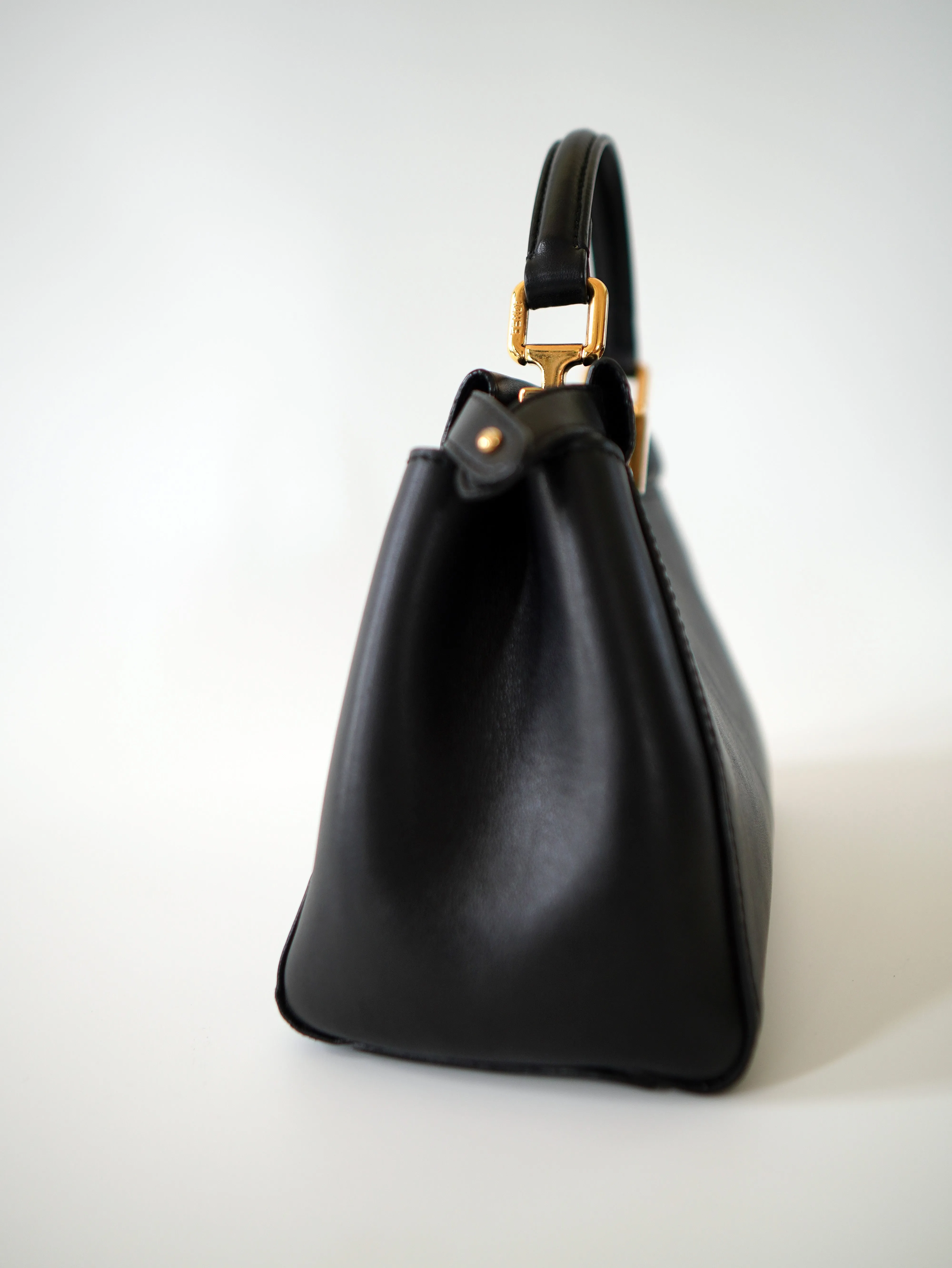 <b>FENDI</b> <br>Iconic Mini Peekaboo