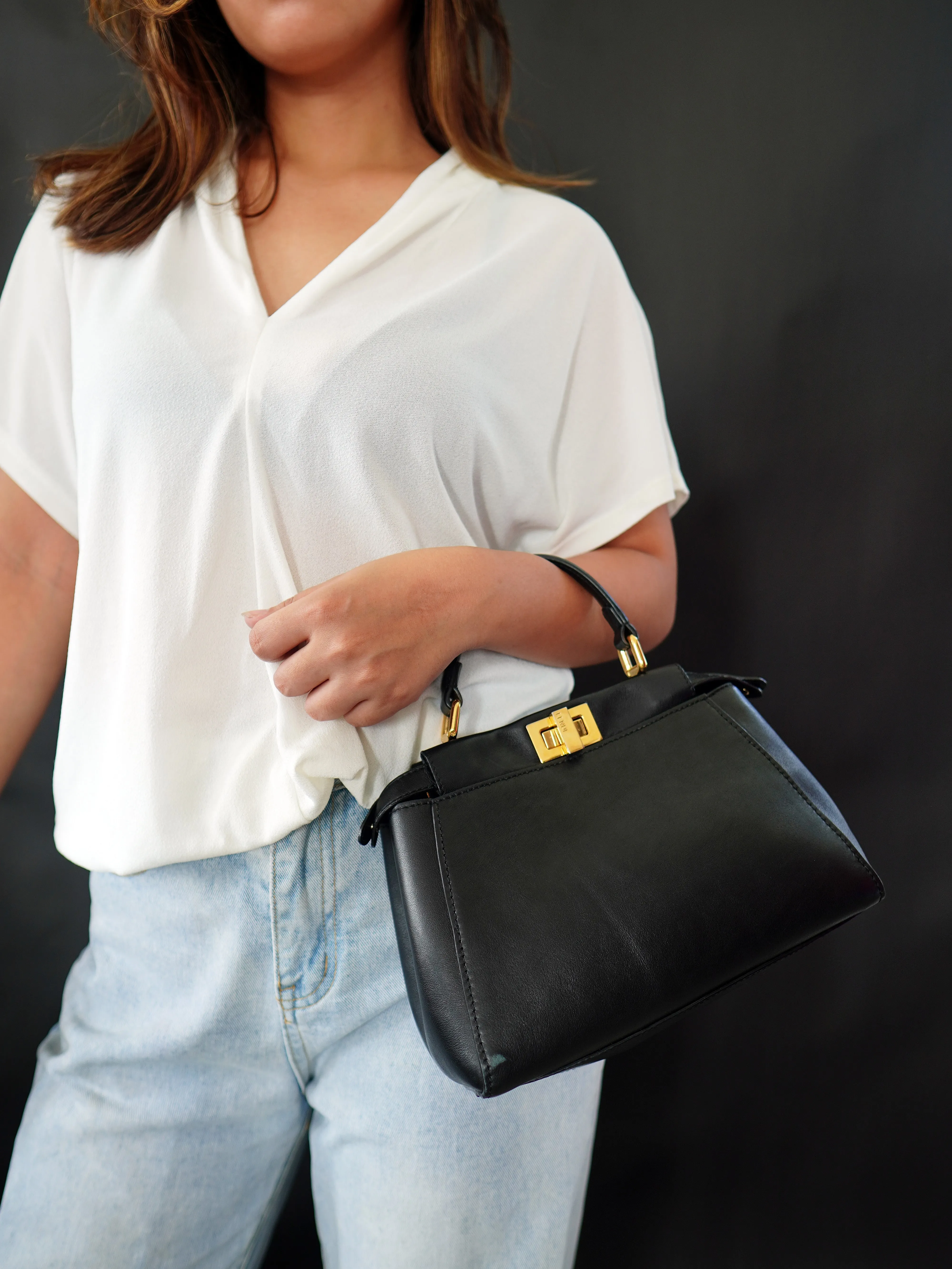 <b>FENDI</b> <br>Iconic Mini Peekaboo