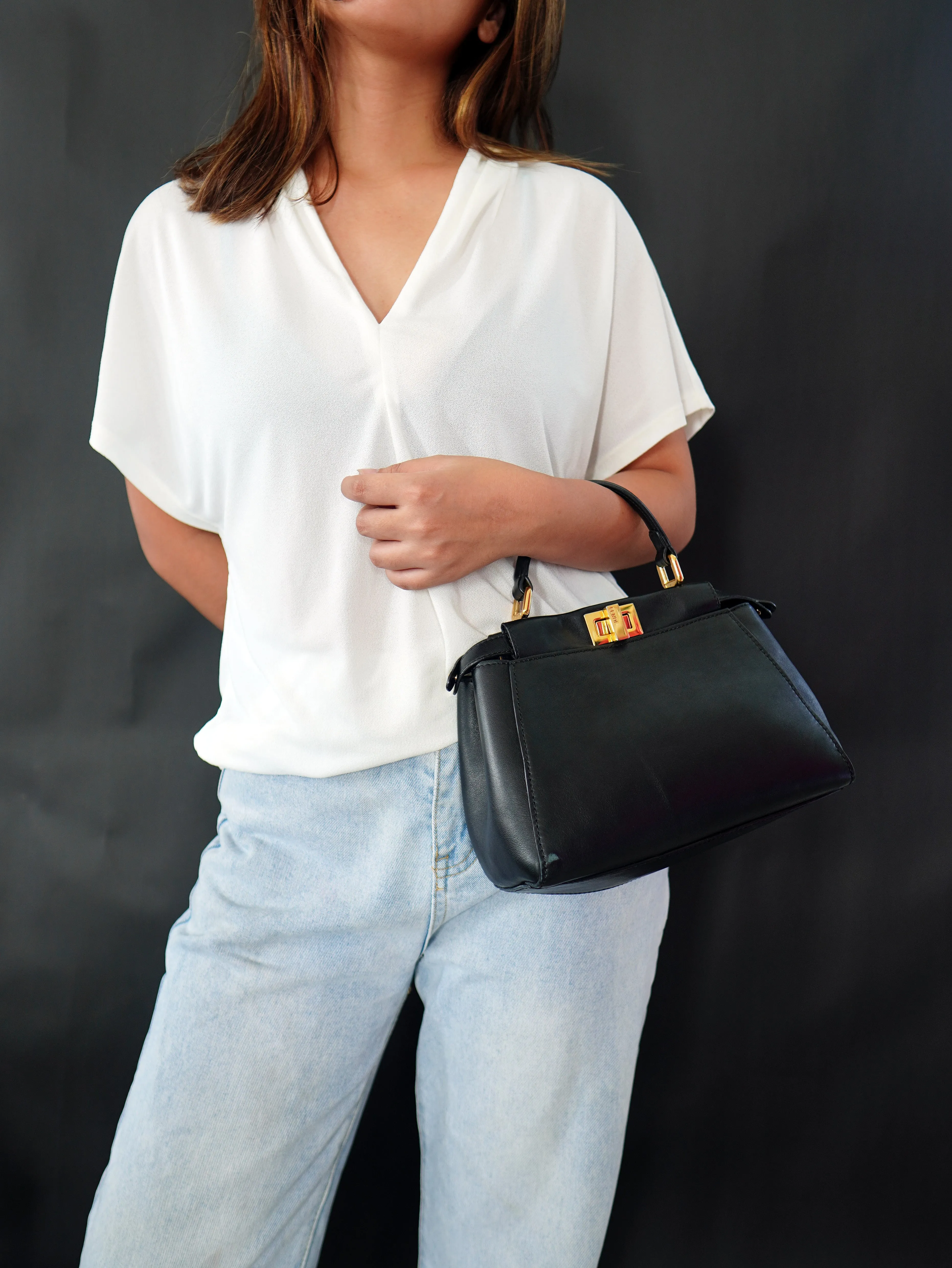 <b>FENDI</b> <br>Iconic Mini Peekaboo