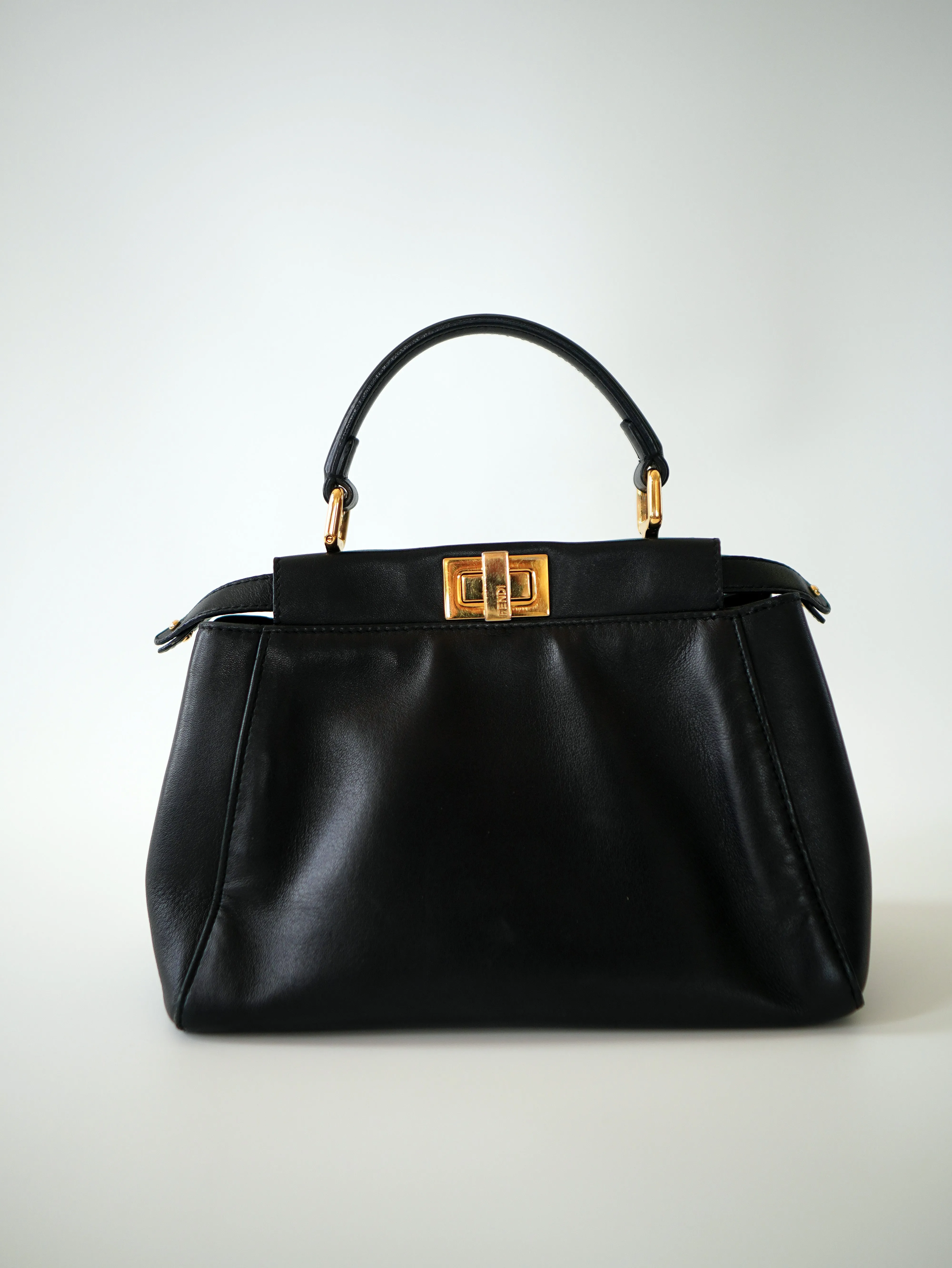 <b>FENDI</b> <br>Iconic Mini Peekaboo