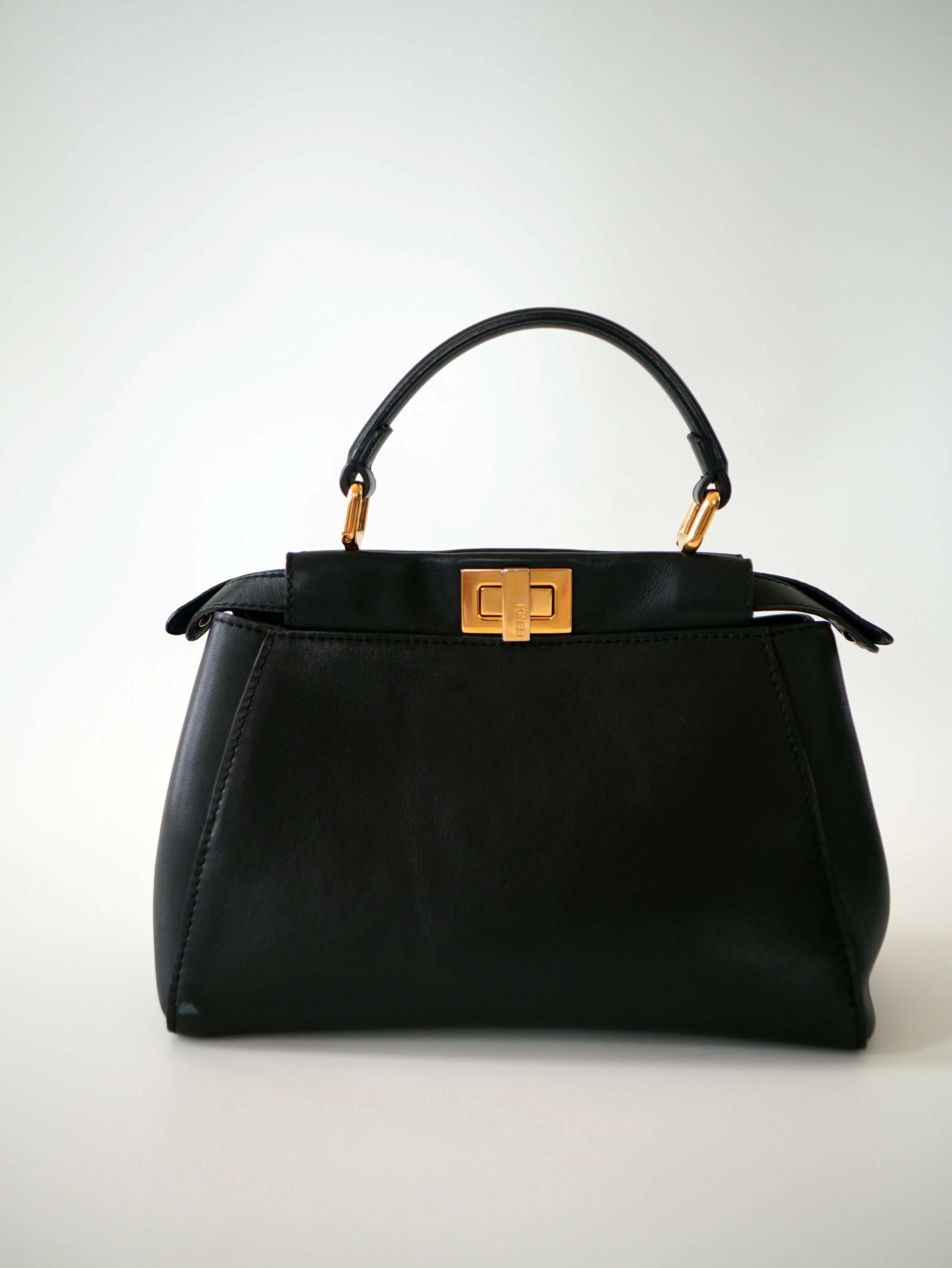 <b>FENDI</b> <br>Iconic Mini Peekaboo
